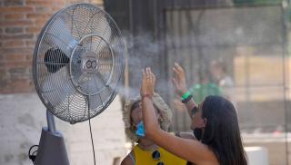 Italiassa on mitattu ennätyshelteitä elokuussa. Kuva Lehtikuva/AP