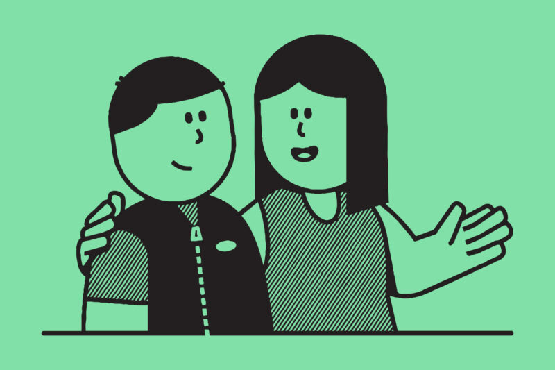 In the illustration, one coworker has their hand on another coworker’s shoulder.